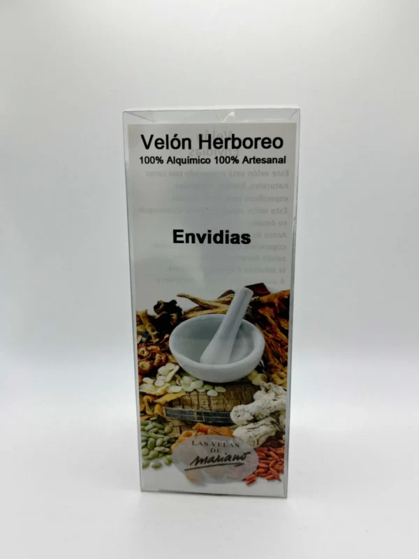 Velón blanco y negro con aceite preparado contra las envidias